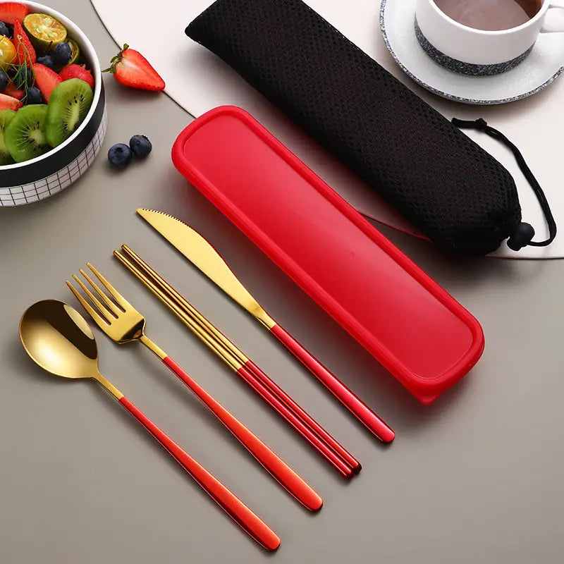 Red and gold stainless steel portable cutlery set with a matching red silicone case designed for convenient on-the-go use.