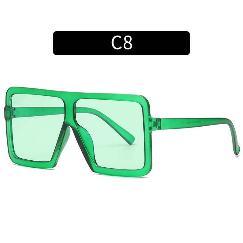 Vibrant green oversized square translucent uv400 fashion sunglasses with a bold rectangular frame and translucent lenses.