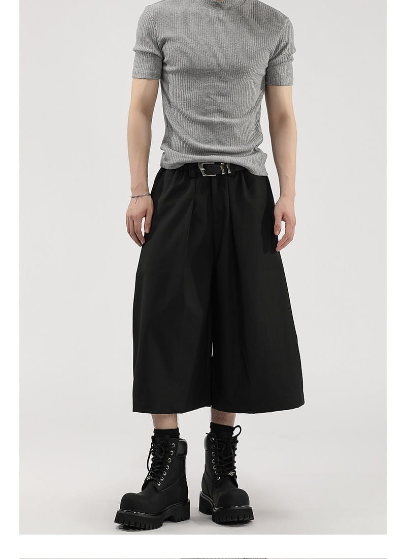 Short de costume pour hommes à jambes larges plissées noir, à taille haute et devant ajusté, idéal pour les occasions formelles