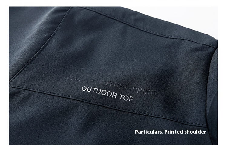 Men casual jacket lightweight outdoor windbreaker in black featuring subtle white embroidered text for adventure spirit and outdoor top with a printed shoulder design.