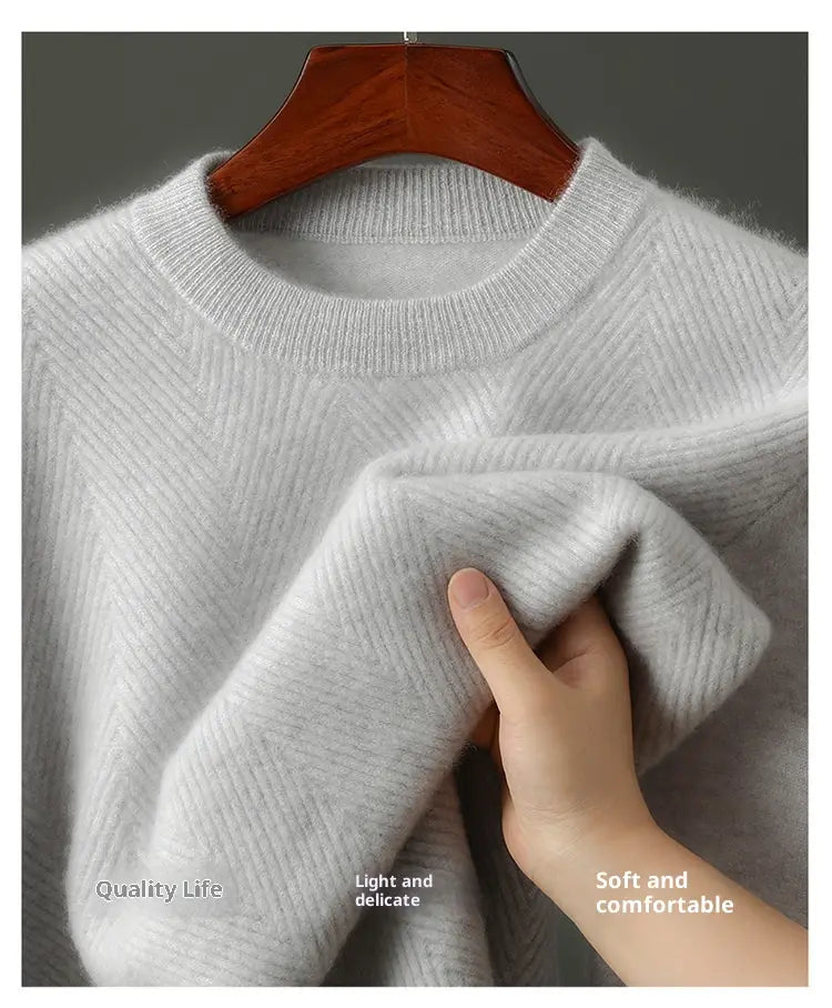 A soft light gray men’s herringbone knit cashmere pullover sweater with a ribbed crew neck and subtle herringbone texture.