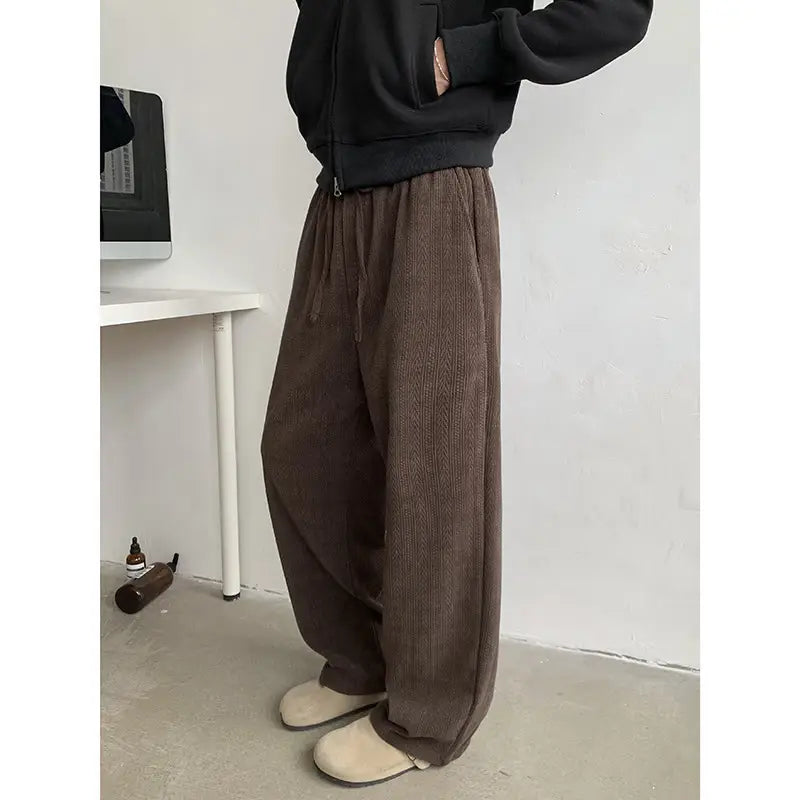 brown corduroy wide leg drawstring pants with a relaxed loose fit perfect for casual wear