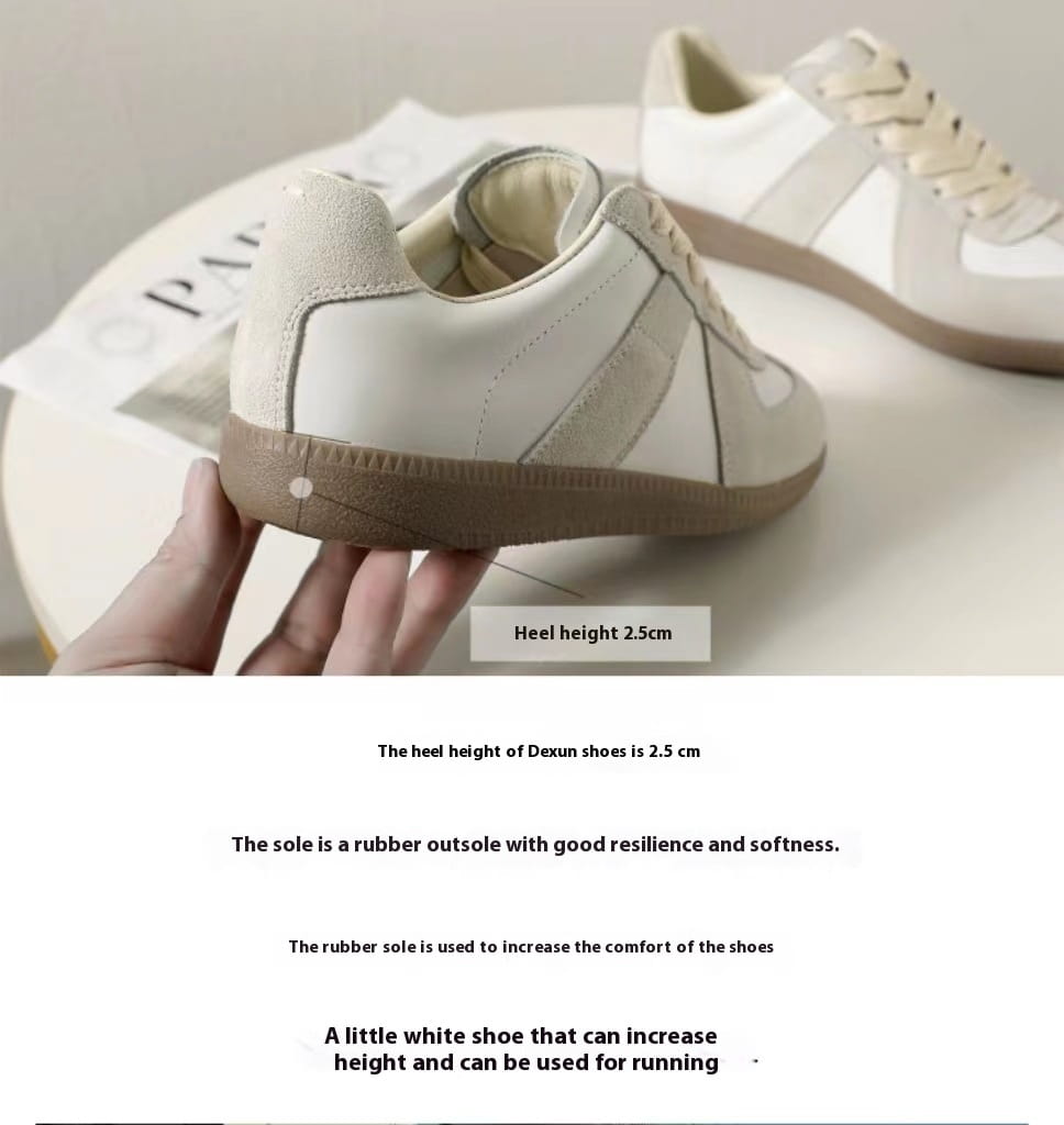 Ein minimalistischer weißer Ledersneaker mit beigen Akzenten und einer Gummisohle, ausgelegt für Komfort und lässigen Gebrauch im vielseitigen Low-Top-Stil.