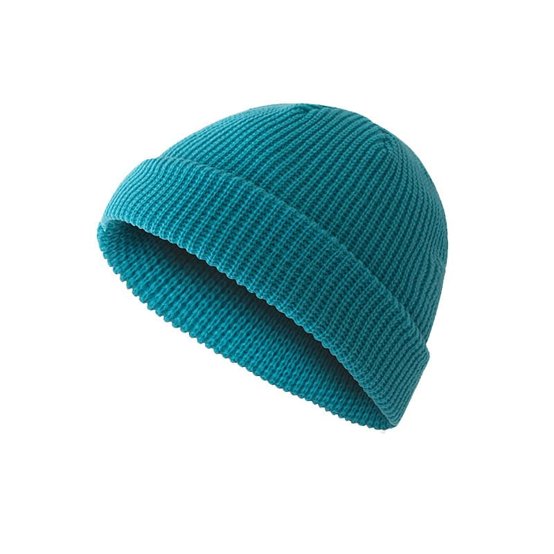 teal ribbed knit beanie with a folded cuff displayed as a dark gray ribbed wool beanie hat product.