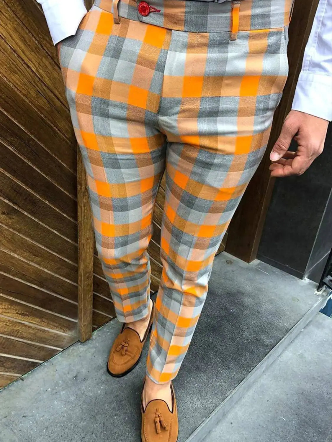 Men plaid casual trousers slim fit check pants in orange and gray tailored fabric with a red button at the waistband.