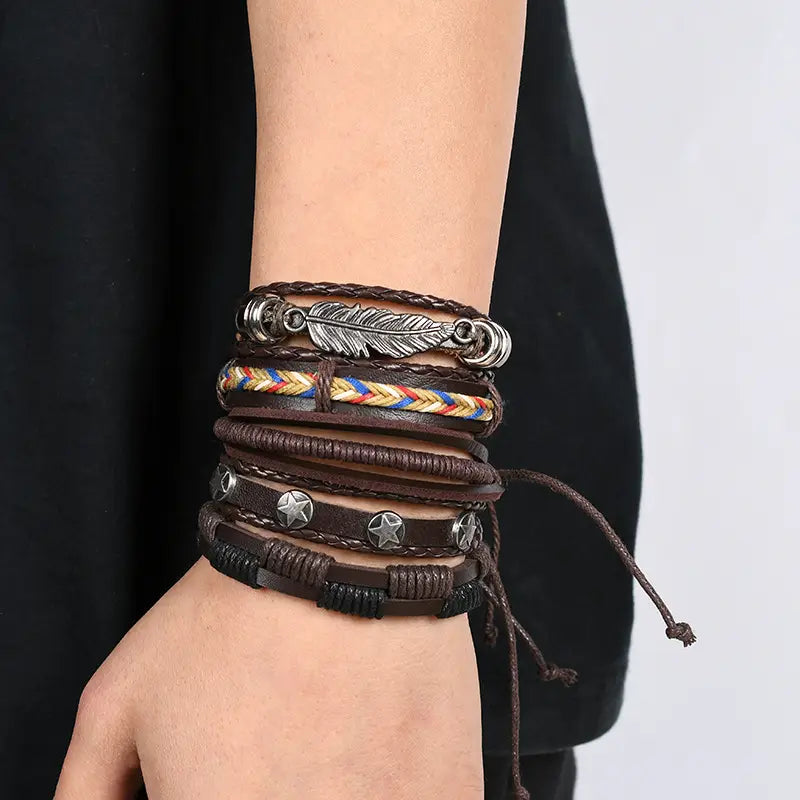 Men’s multilayer brown leather bracelet featuring star charms feather charm and colorful braided accents.