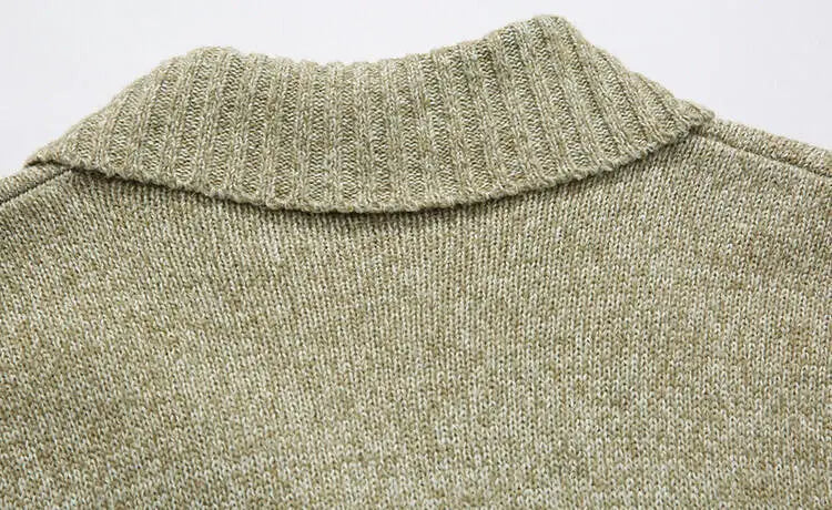 Men’s double-breasted knit cardigan featuring a soft olive-green ribbed knit collar with textured heathered fabric.