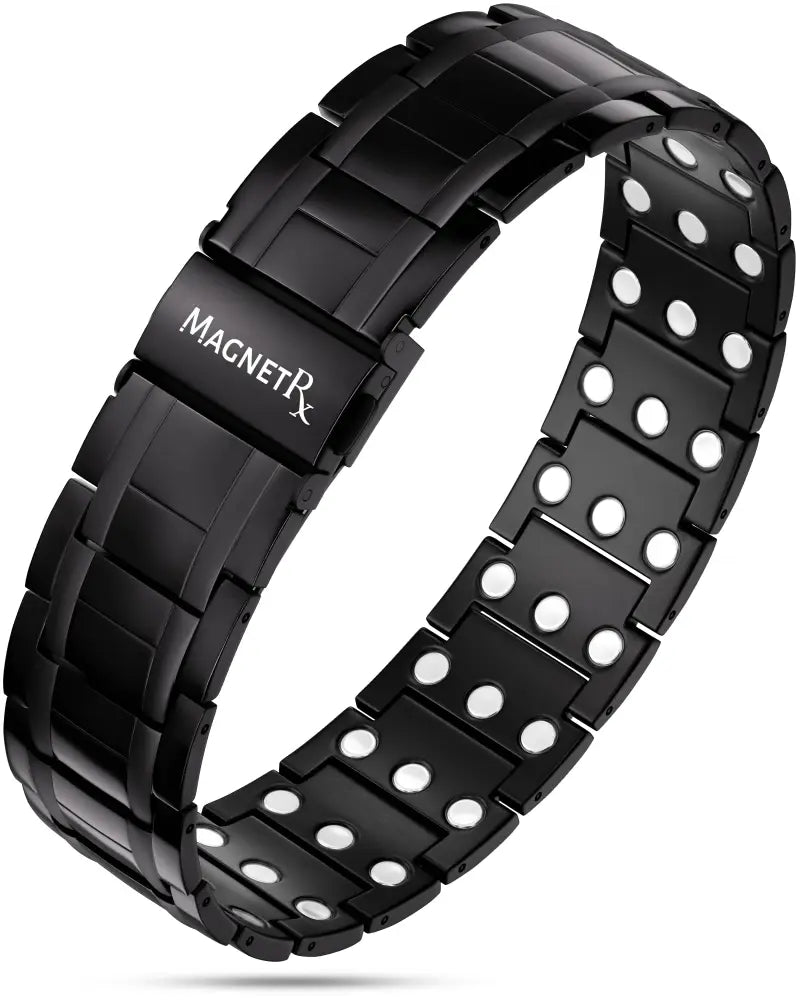 Men’s black titanium triple strength magnetic therapy bracelet with sleek polished finish and white circular magnets