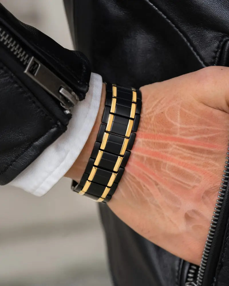 Triple strength black and gold titanium magnetic bracelet with sleek interlocking rectangular links