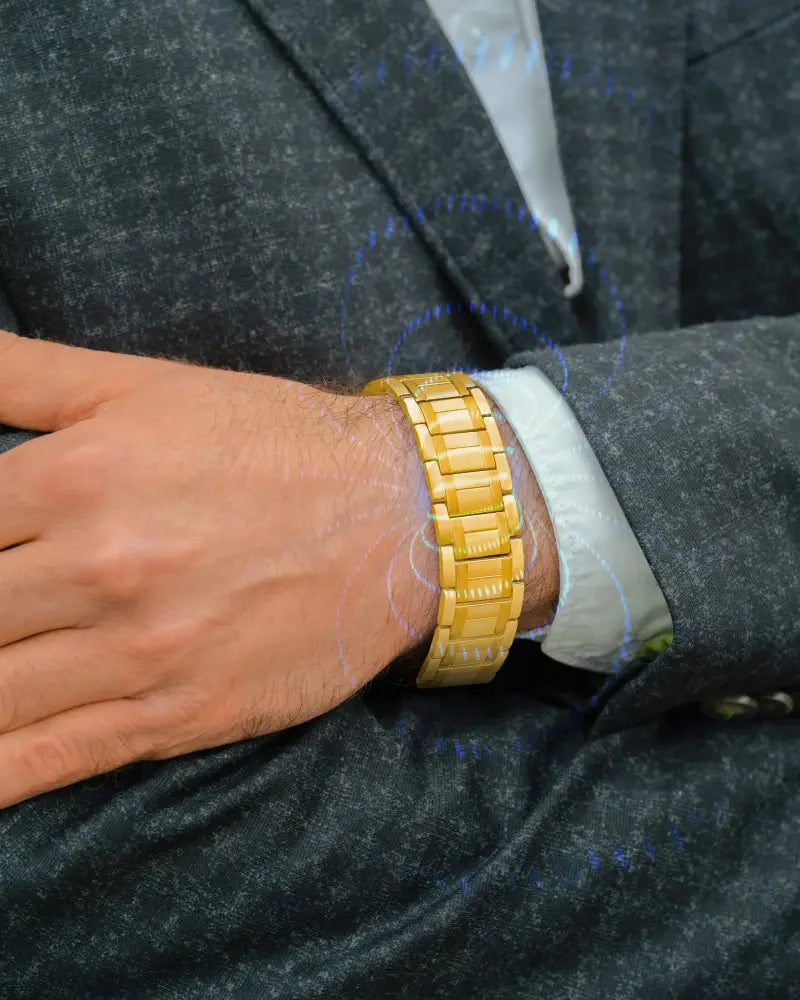 Men’s gold 3x strength titanium magnetic therapy bracelet with a gold-toned metal link watch band and polished finish