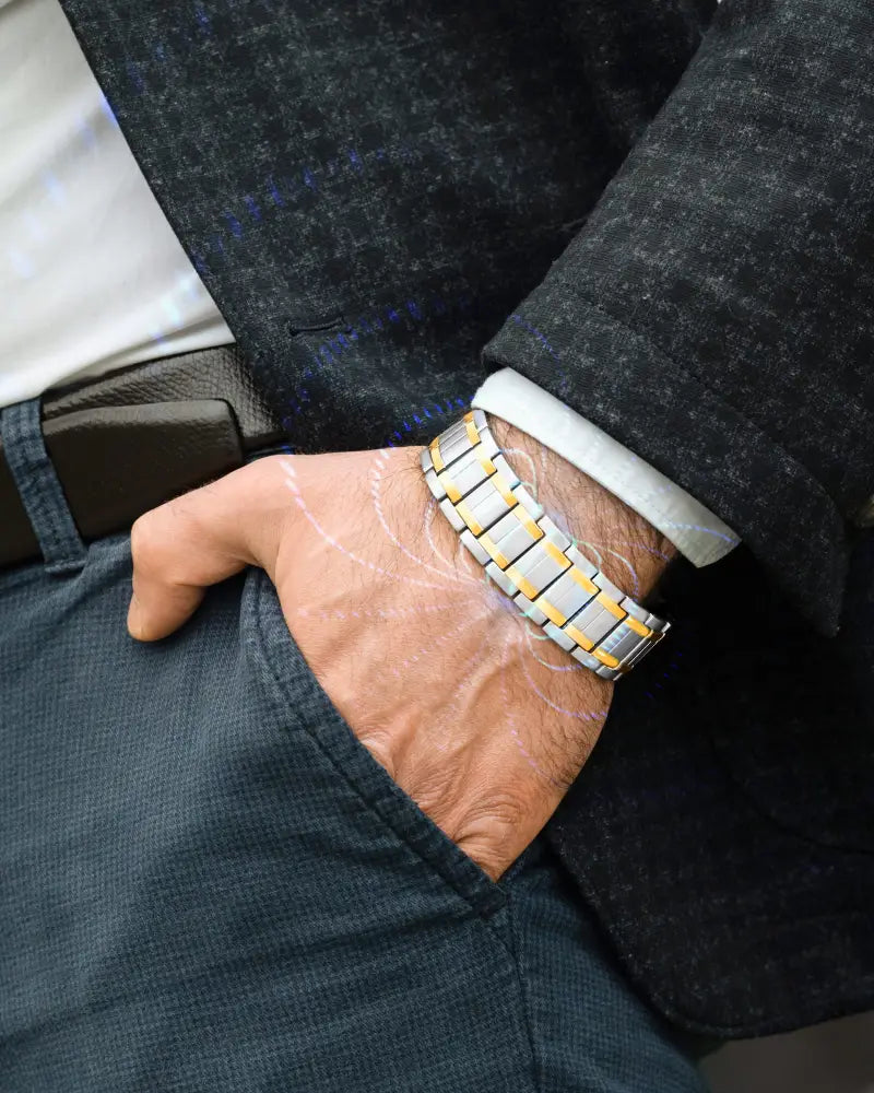 Two tone titanium magnetic therapy bracelet for men with a two-tone stainless steel watch band of silver and gold links