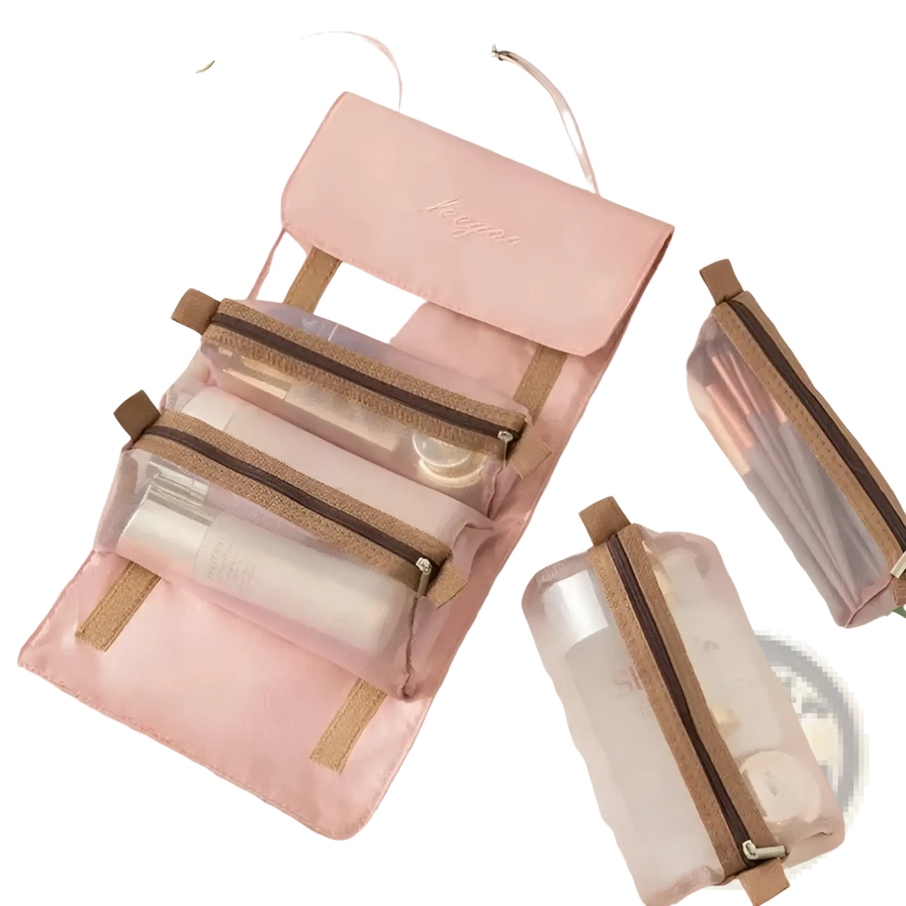Pink roll-up 4 in 1 travel makeup bag with transparent front pockets and brown zipper pulls for toiletry organization