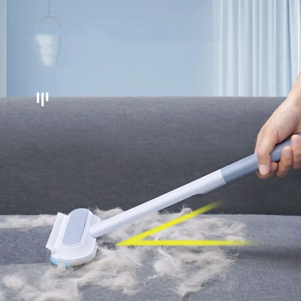 4-in-1 multi-surface pet hair and screen cleaning brush with white and gray dual-sided ergonomic handle for grooming