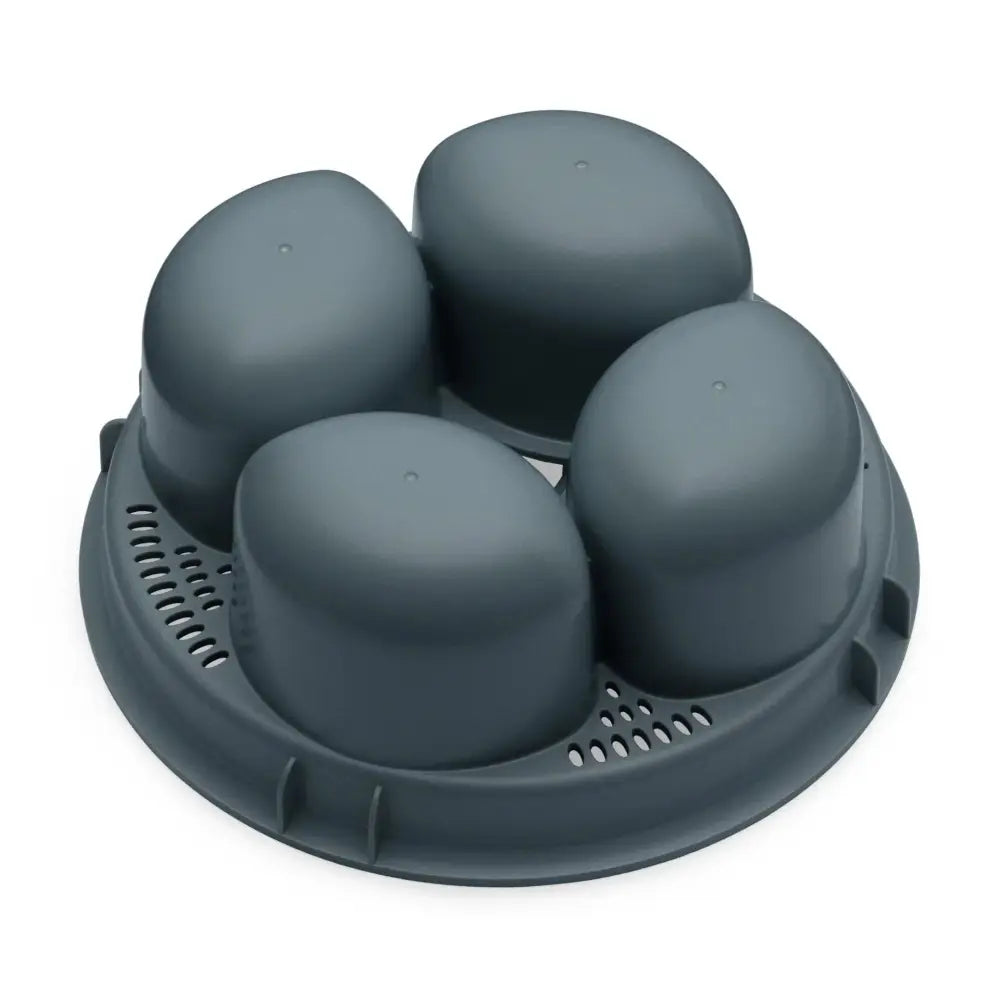 Dark gray plastic egg carton with four rounded compartments in 4-in-1 silicone egg poacher and steamer mold set