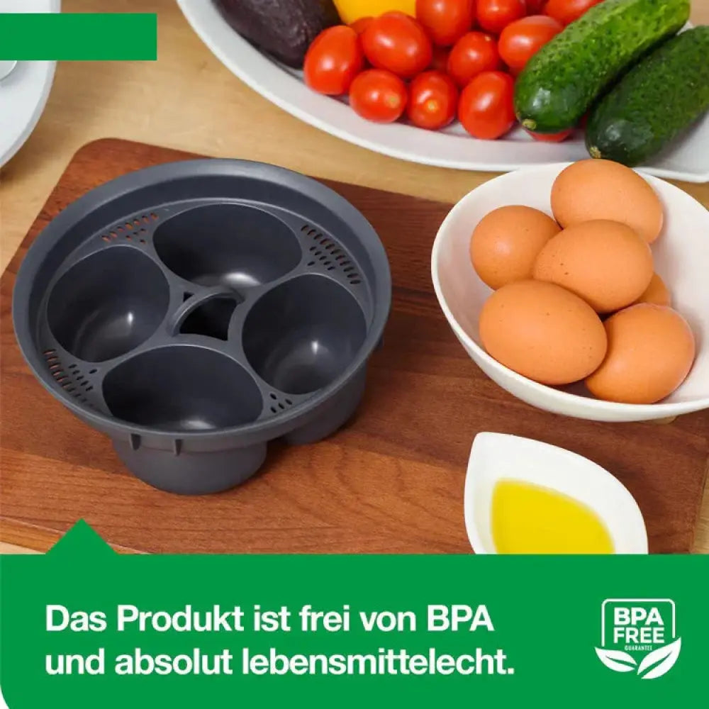 Black plastic 4-in-1 silicone egg poacher and steamer mold set with five compartments and perforated sides for steaming eggs