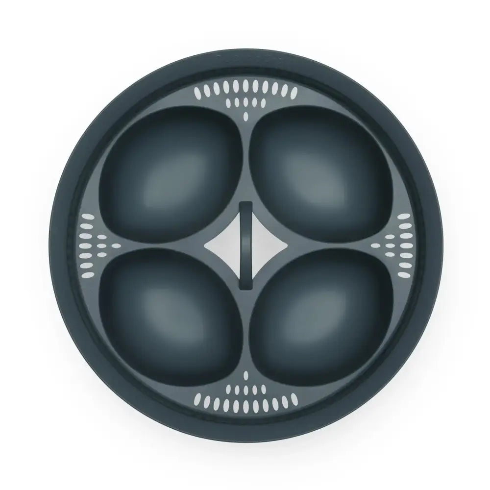 Black silicone 4-in-1 egg poacher and steamer mold set with four oval compartments and white dotted accents