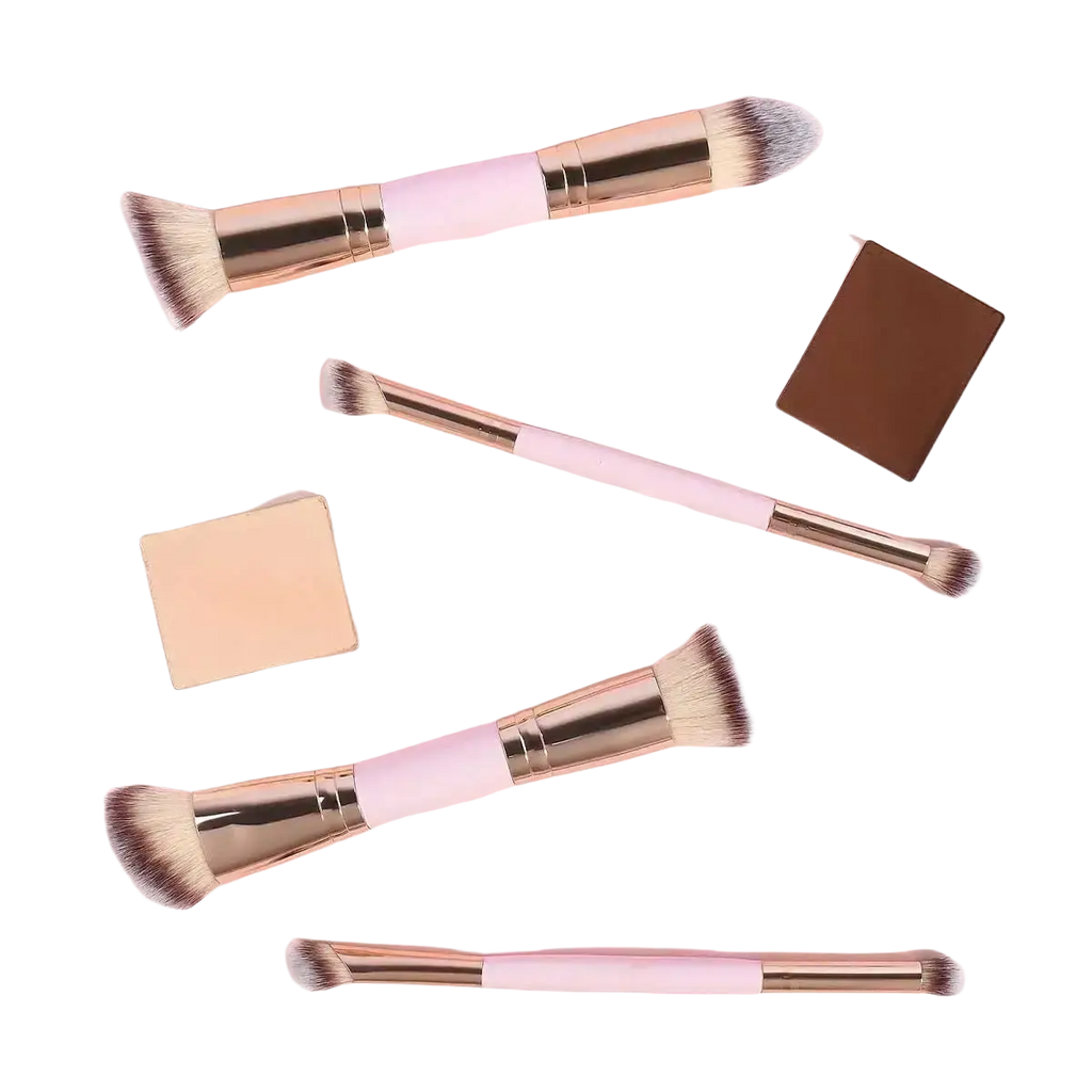Set of five wool fiber makeup brushes with pale pink handles for basic makeup applications and precise makeup application