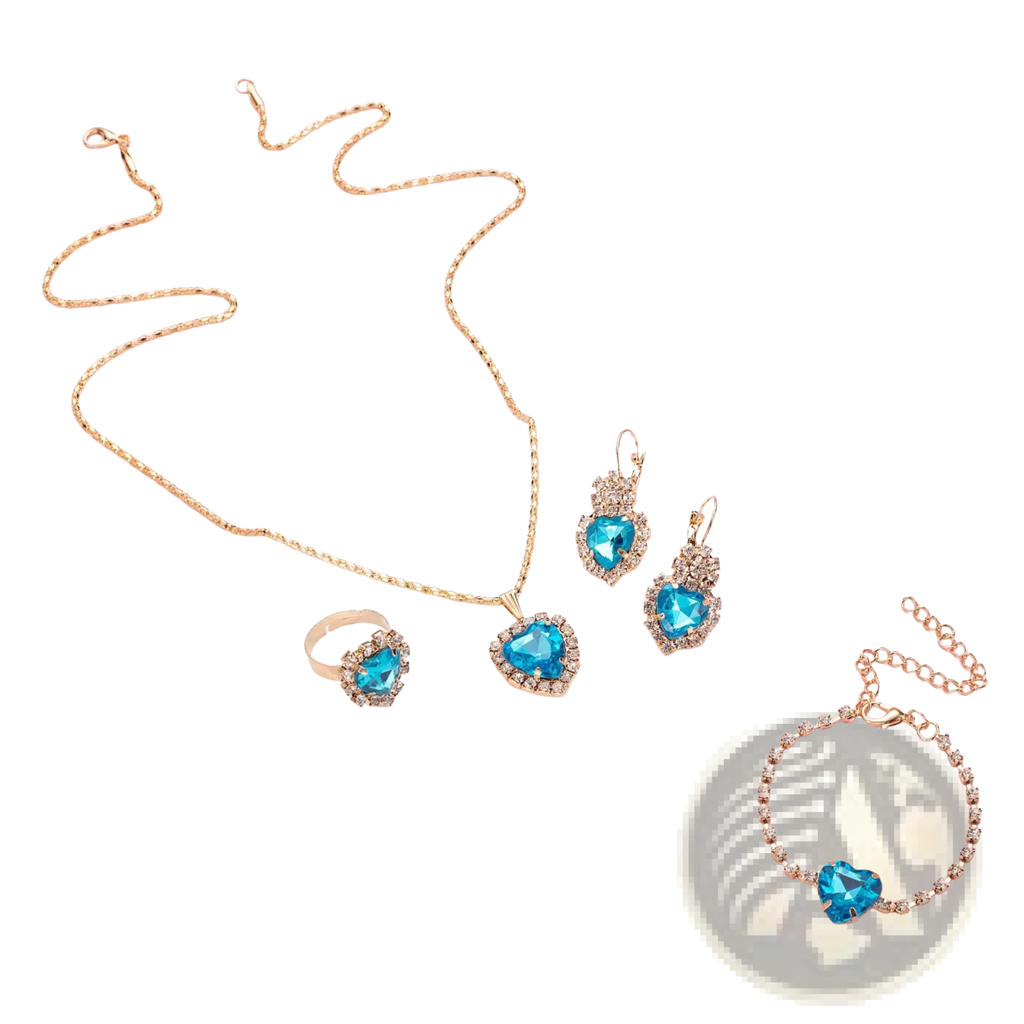 Gold-toned 4 piece heart rhinestone jewelry set with blue heart-shaped gemstones and clear matching crystals