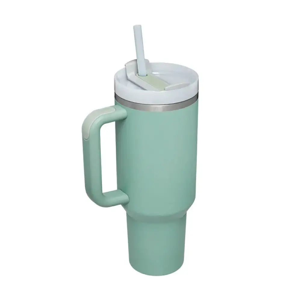 Mint green Arbaglobal 40 oz insulated tumbler with white lid silver rim and integrated handle for hot and cold drinks