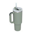 A sleek matte sage green arbaglobal 40 oz insulated tumbler with handle white lid and straw for hot and cold drinks