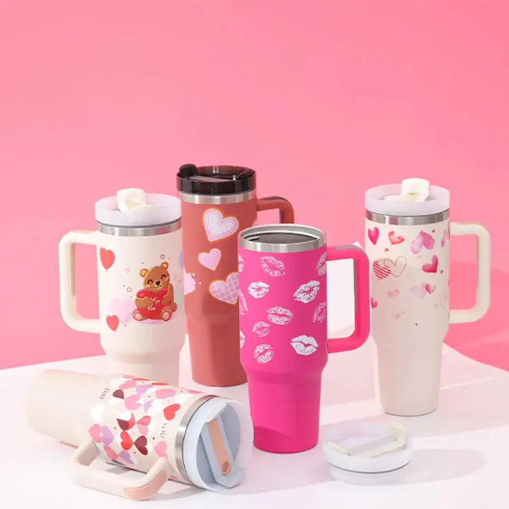 Pink insulated 40 oz arbaglobal travel mug with handle straw and white lipstick print design