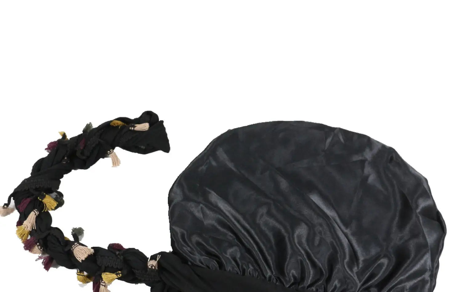 black satin lined beard twist cap with braided strap and multicolored tassels shown from the back.