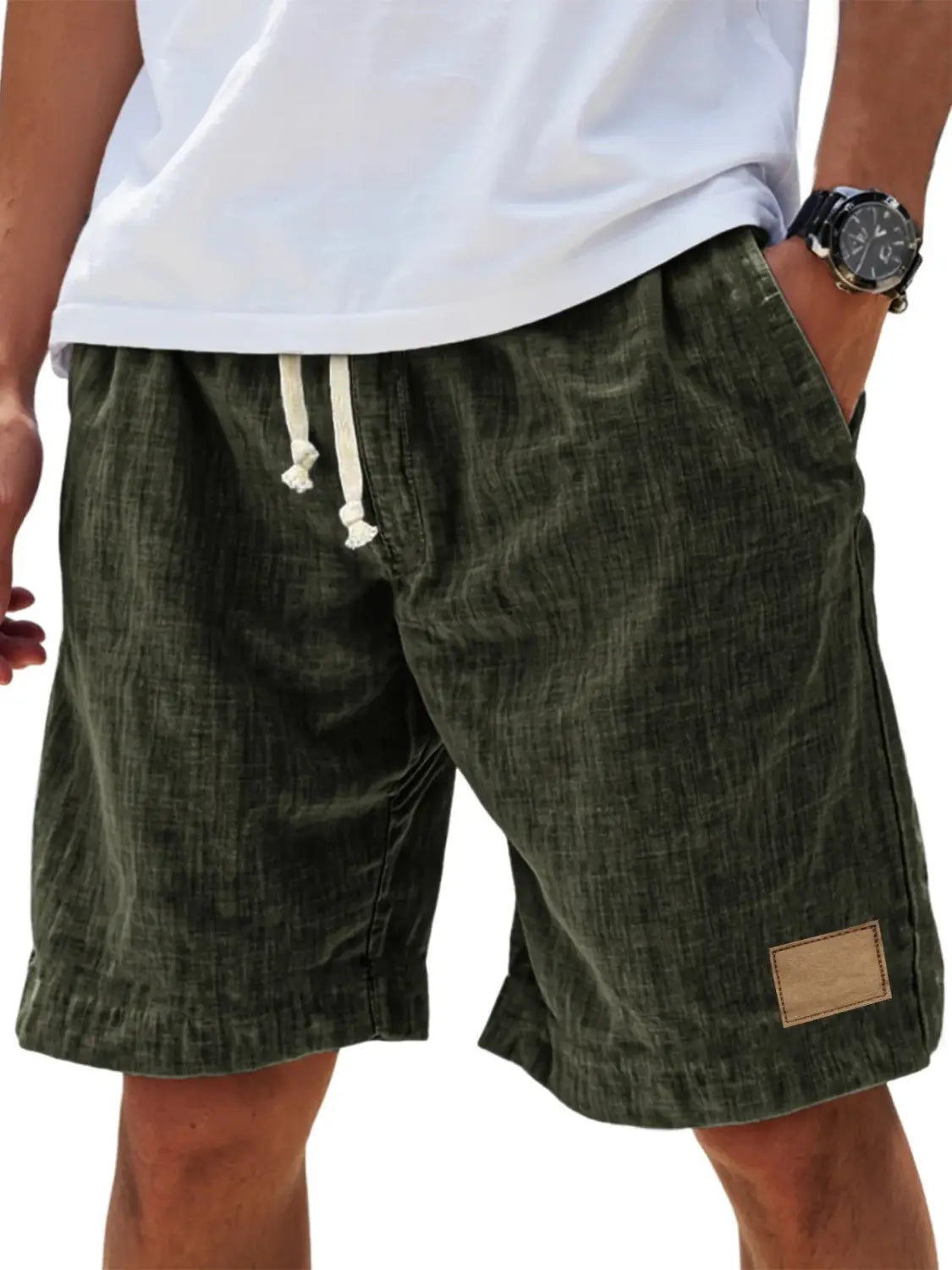 men linen holiday shorts in olive green corduroy with white drawstrings and a tan patch featuring a retro breathable loose fit design.