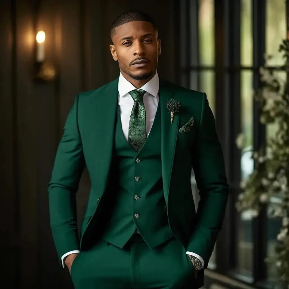 Men slim fit three piece suit in elegant emerald green featuring a matching patterned tie and pocket square for formal occasions