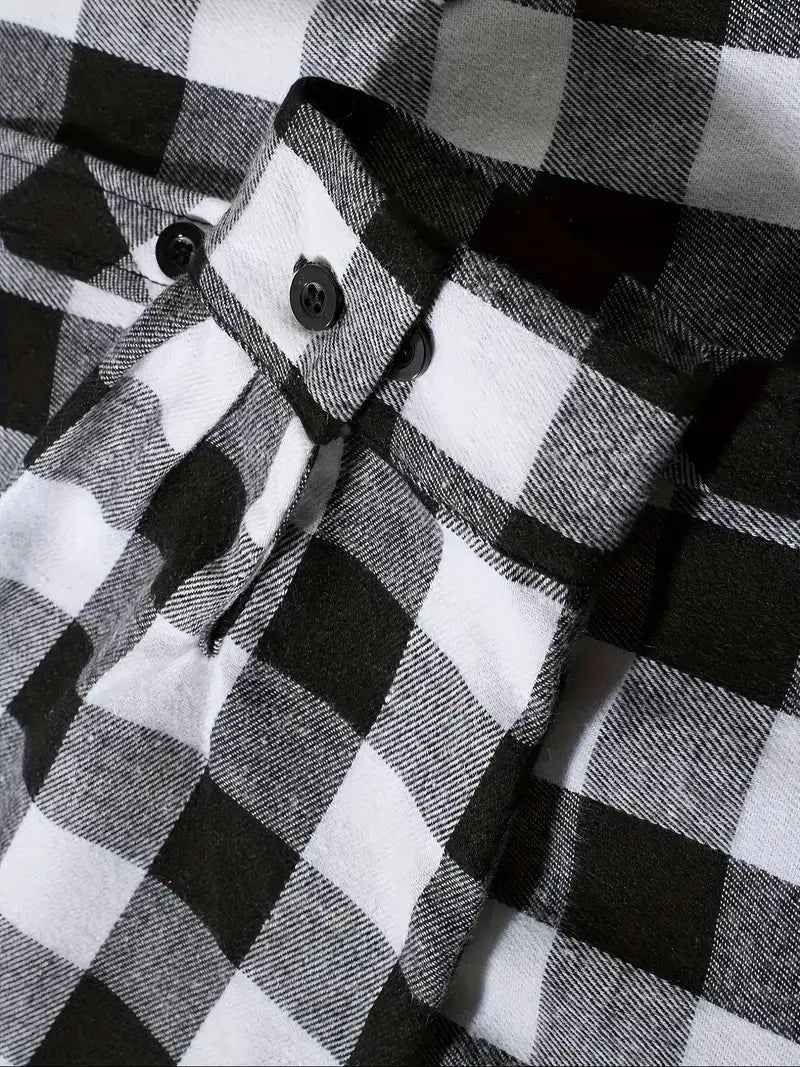 Men’s plaid hooded flannel shirt in black and white checkered pattern with black buttons made of soft flannel material.