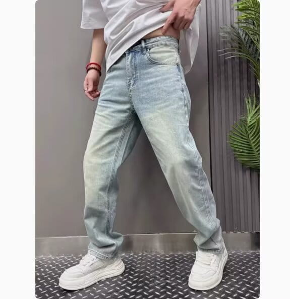 Men’s light wash denim jeans with a relaxed straight leg cut and classic five-pocket design.