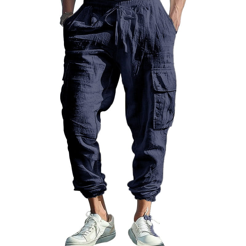men linen cargo pants in dark navy featuring multiple pockets and a drawstring waistband with cuffed ankle for casual wear