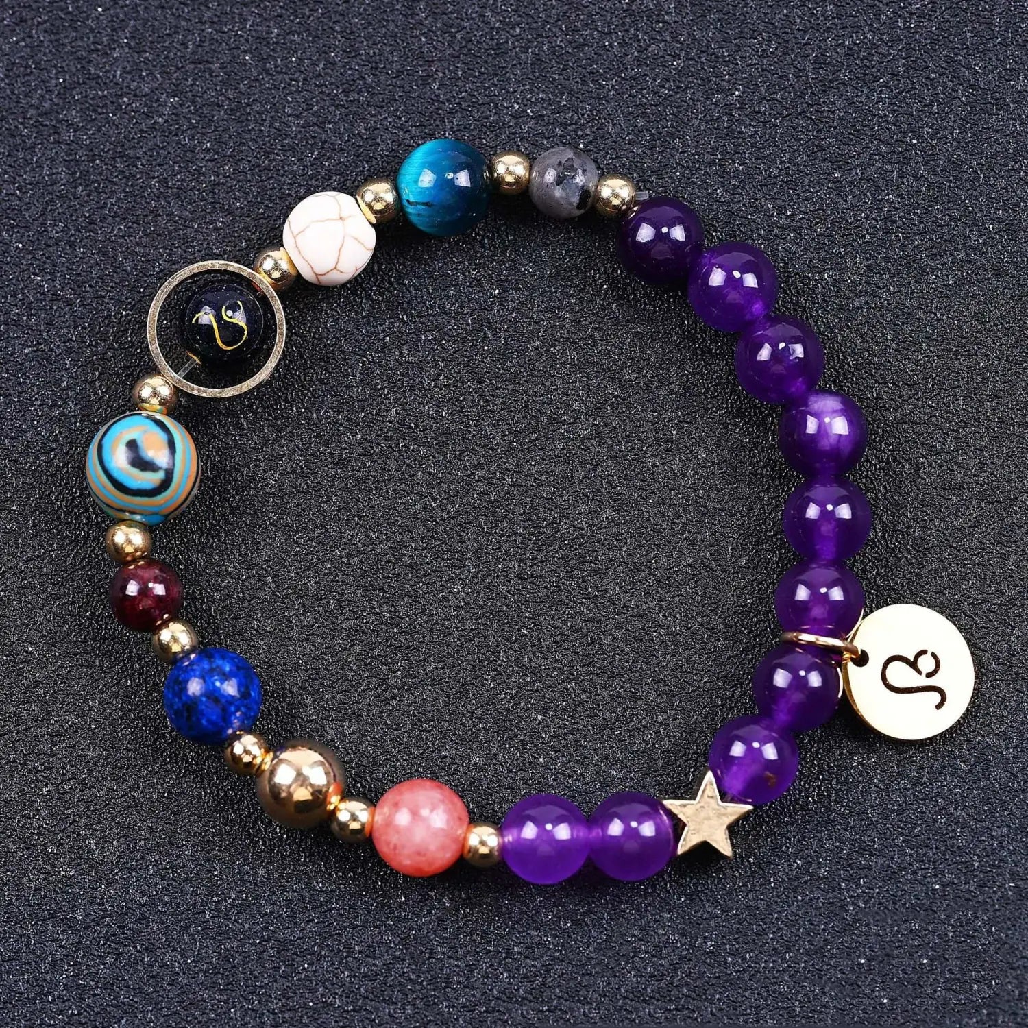 A natural amethyst and agate twelve zodiac beaded bracelet featuring colorful purple, blue, red, and gold-toned beads with a star charm and zodiac symbol charms.