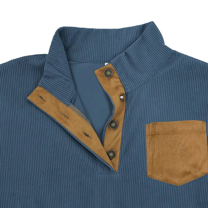 Slim fit corduroy patchwork pullover featuring a blue corduroy shirt with tan suede collar placket and pocket.