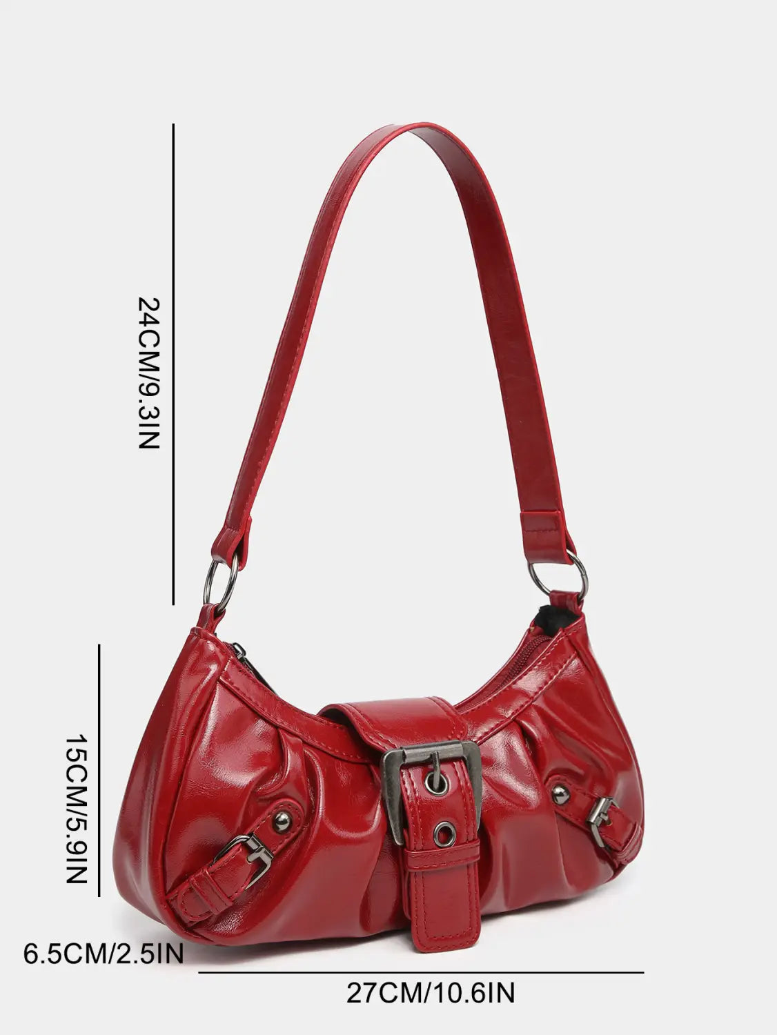 Red glossy faux leather vintage leather shoulder bag with silver-toned buckle and strap hardware.