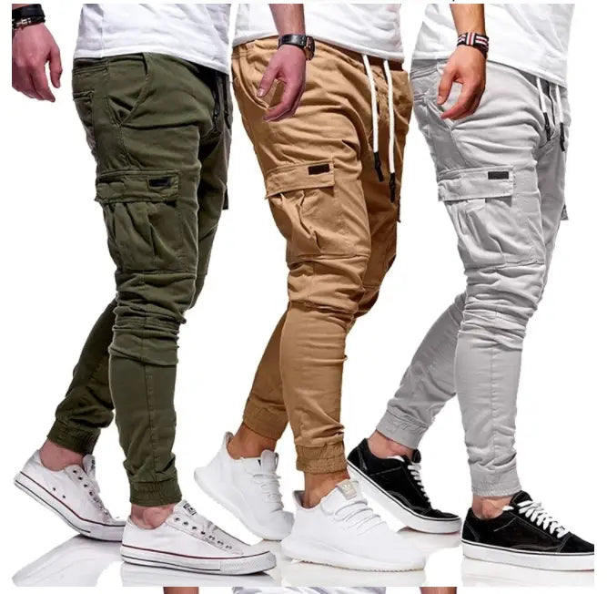 three pairs of men cotton cargo joggers in olive green tan and light gray featuring drawstrings and multiple pockets for casual wear
