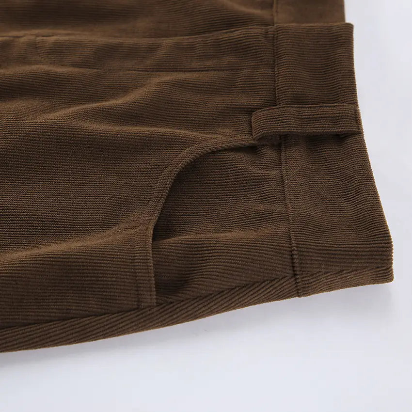 Brown corduroy pants with classic textured weave and visible stitching details from the retro corduroy mini skirt with matching belt collection.