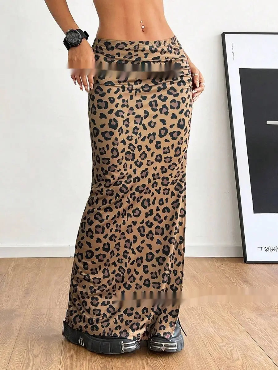 A tan and black leopard print high waisted maxi skirt with a fitted design and side slit.