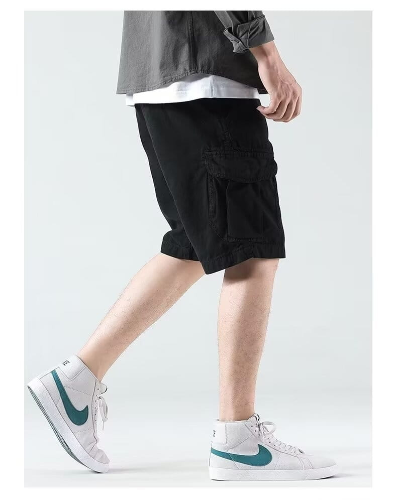 Black cargo shorts for men with a relaxed fit and multiple pockets designed for comfort and utility.