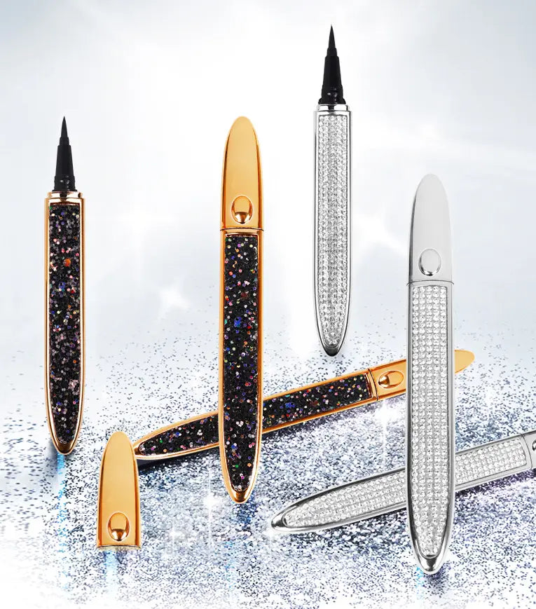 sparkling gold and silver self-adhesive eyeliner pens for false lashes with jeweled caps featuring waterproof formulas