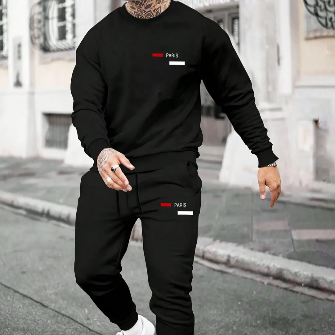 black paris-themed fleece hoodie and joggers set featuring red and white logo accents on the chest and left thigh.