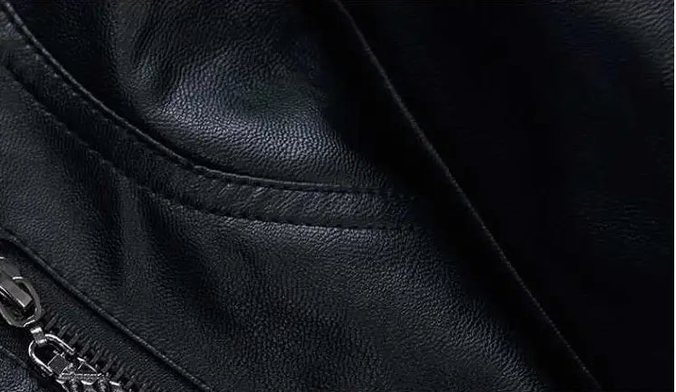 Black leather moto jacket with high collar puff sleeves and a silver zipper.