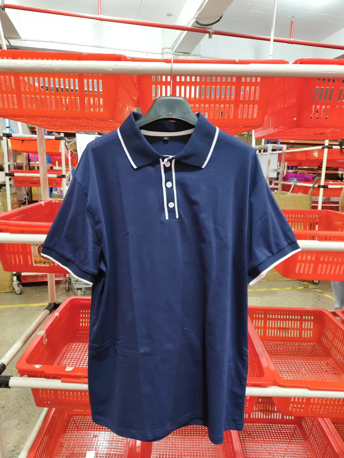 Navy blue men jacquard short sleeve polo shirt with white trim on the collar and sleeve cuffs.