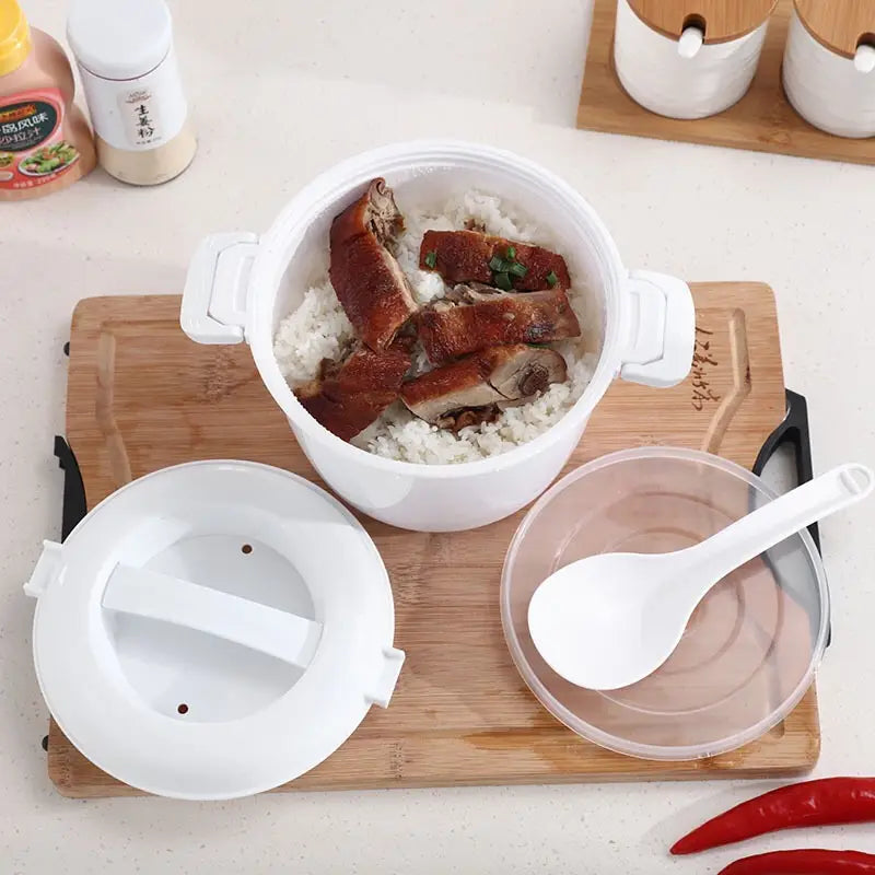 White plastic microwave rice cooker with steamer lid and handles containing steamed white rice topped with sliced roasted duck.