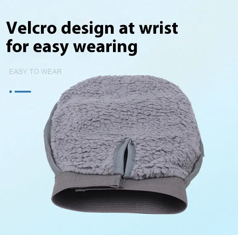 Gray fuzzy wristband with velcro closure on the back side for easy wearing of the pet grooming glove silicone hair remover bath brush.
