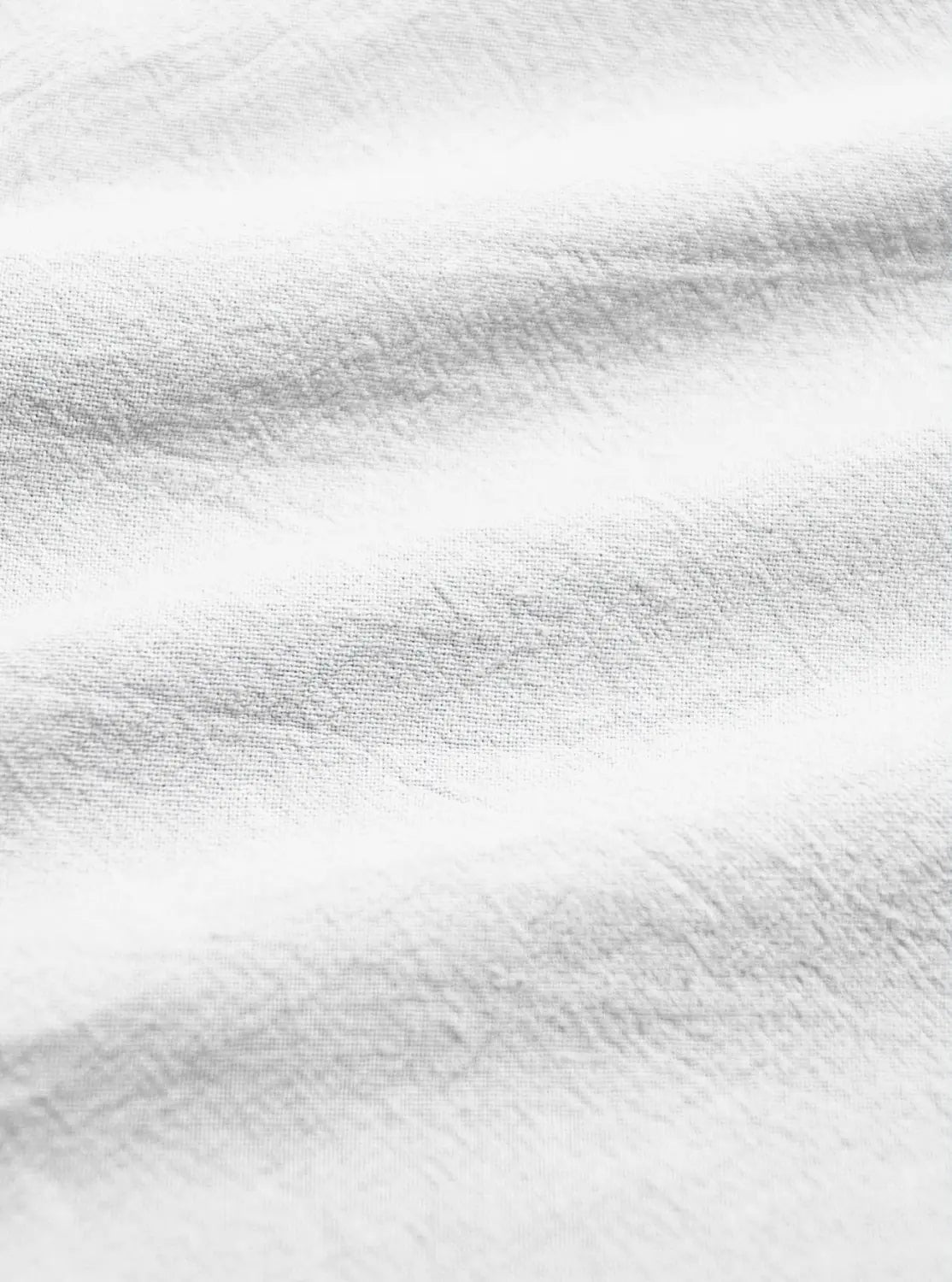 white textured fabric with a soft slightly wrinkled surface used in mens cotton linen drawstring shorts