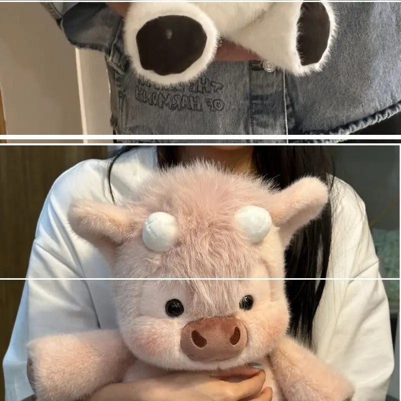 Soft pink plush pig with white pom-pom horns and brown snout in a plush cow and pig soft stuffed animal toy for kids.