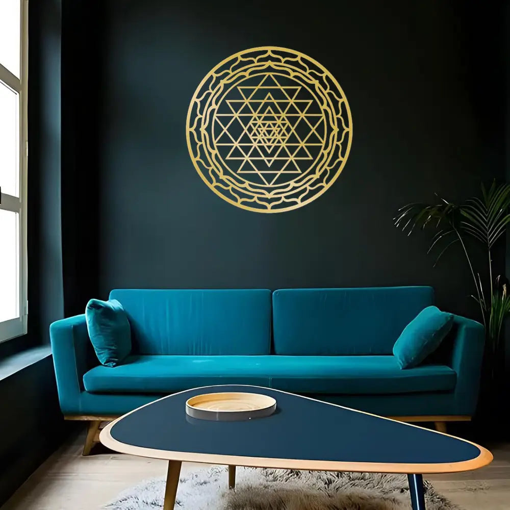 Gold-colored sri yantra metal wall art decor featuring intricate geometric patterns for sacred geometry design.