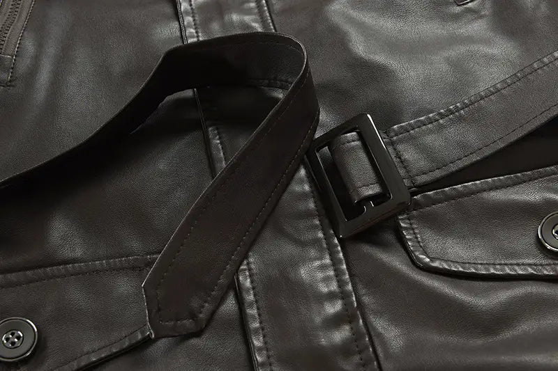 Men’s mid-length fleece lined faux leather coat in black with a matte finish and black plastic buckle shown from the back side.