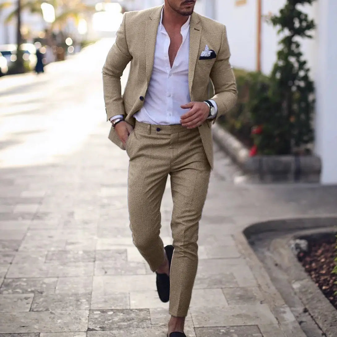 Beige textured digital print casual suit set for men featuring a matching suit ensemble with trousers and a white button-down shirt.