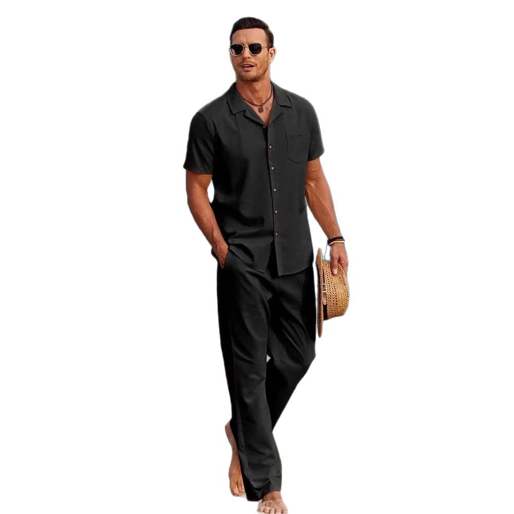 Mens beach shirt and pants set featuring a black short-sleeved button-up shirt with a collar and chest pocket for a casual summer outfit.